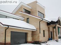 A-462-1K проект трехэтажного дома из кирпича с цоколем и мансардой и гаражом размером 14 на 21 