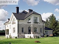 V-336-1P проект двухэтажного дома из пенобетона с цоколем и гаражом размером 13 на 18 